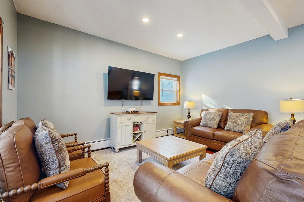 Living area with smart TV and comfortable seating