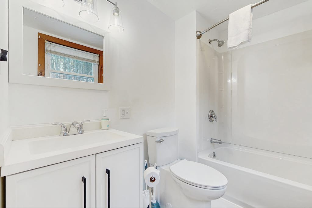 Bathroom with tub and shower combination